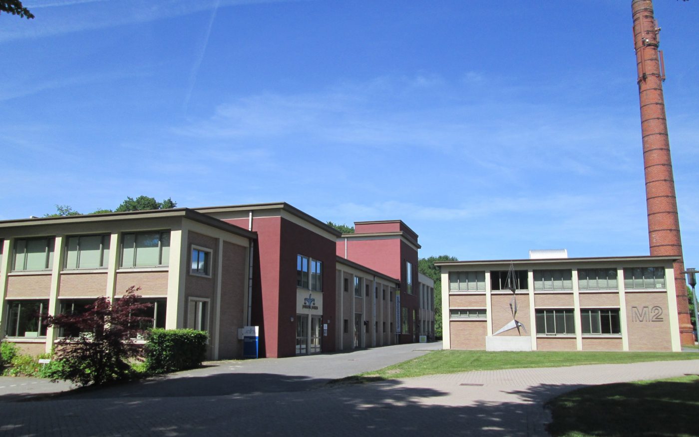 Renovation de Fabriek, Ermerweg, Emmen. Terca façade bricks Beigerood VB WF.