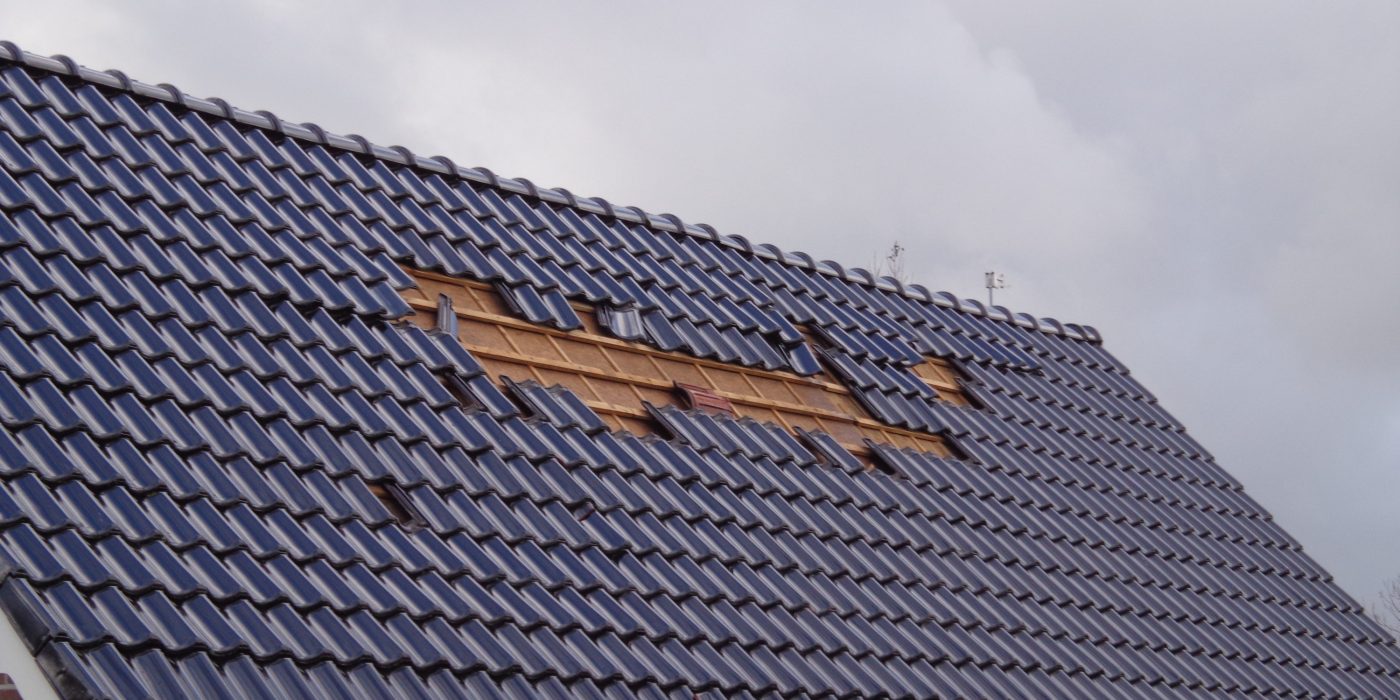 Storm damage wrong achoring roof tiles. Anchoring right patron and right roof tile hook Koramic roof tiles.