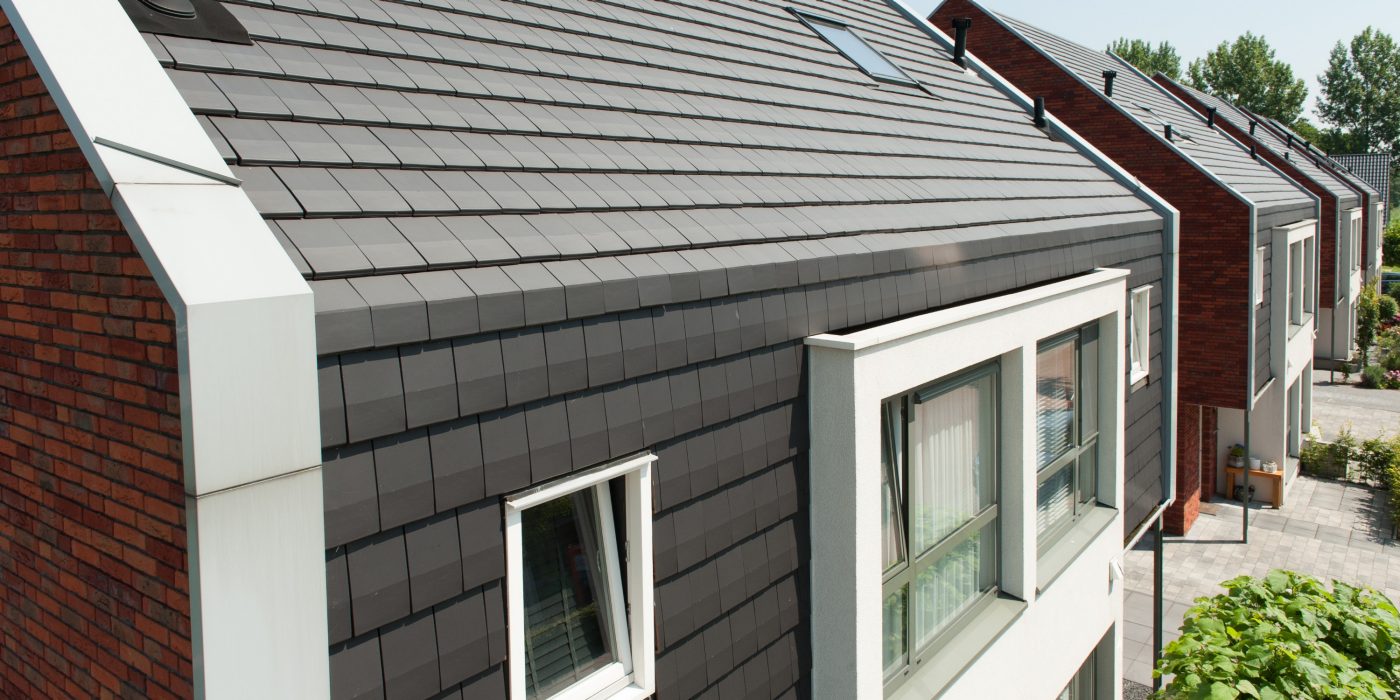 Dakpannen gevel, duurzame en unieke uitstraling met losmaakbare gevelbekleding.