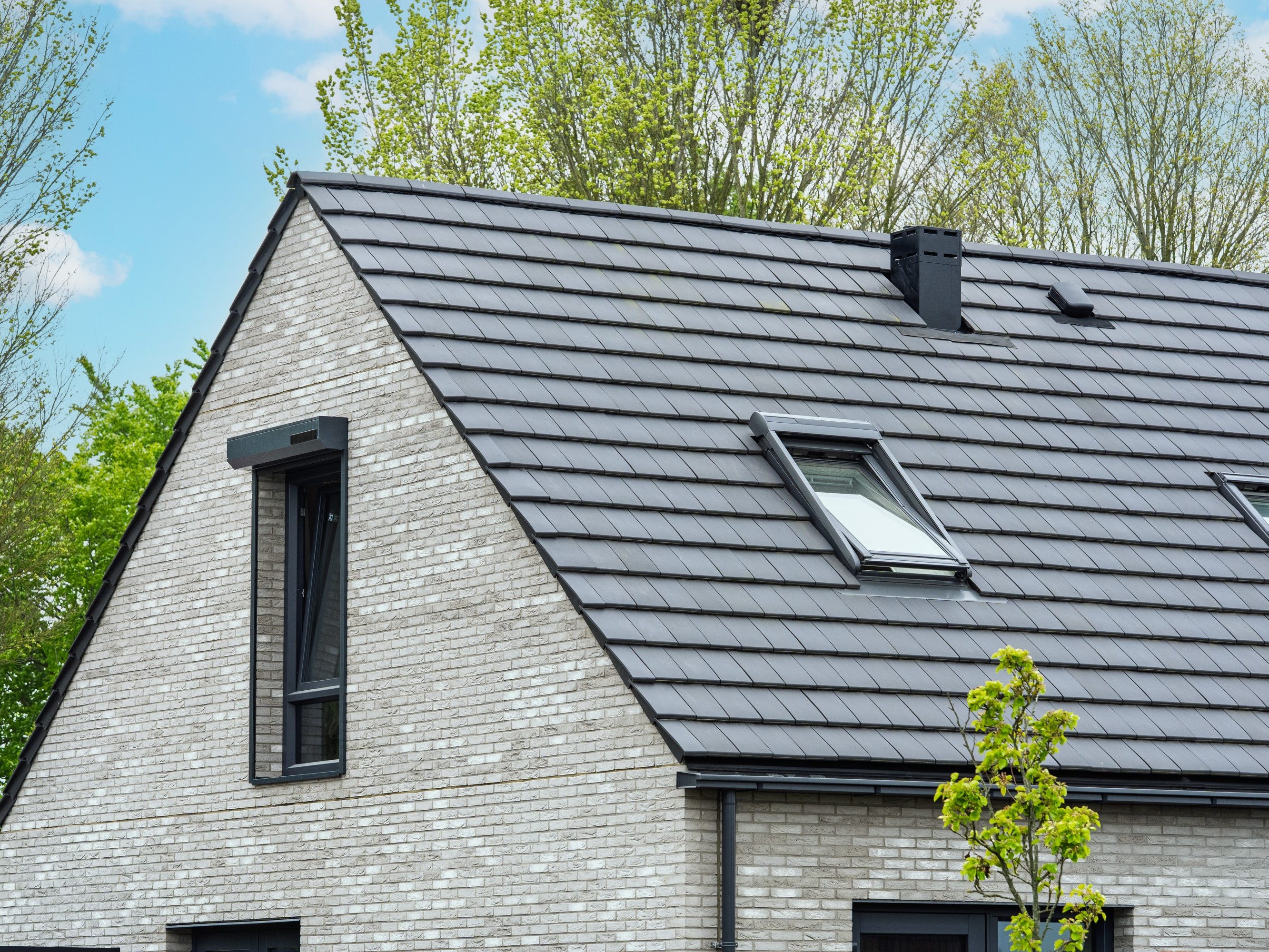 Nieuwbouw geschakelde woningen met dakpan Visio, Sint Laurens