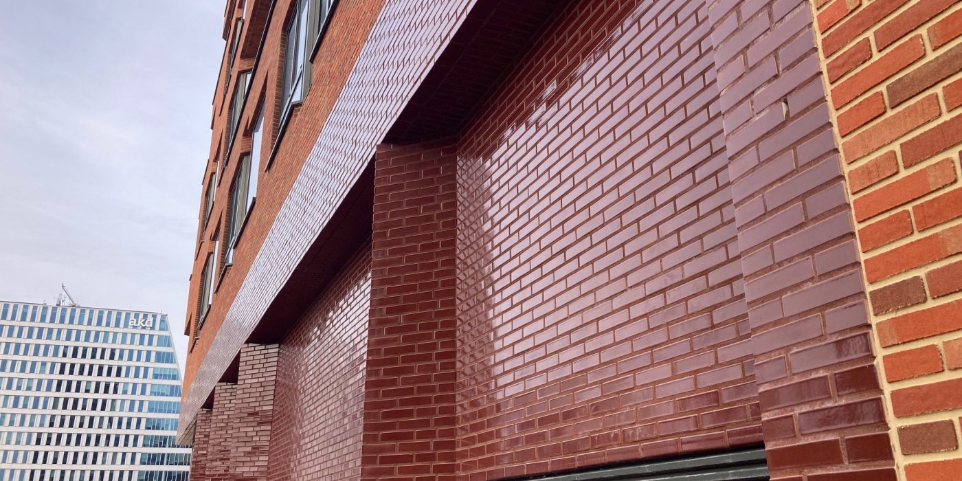 Nieuwbouw appartementen | The Pulse, Amsterdam | Gevelbakstenen: glazuurbakstenen
