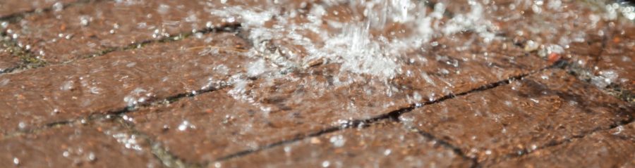 Water is falling on pavers