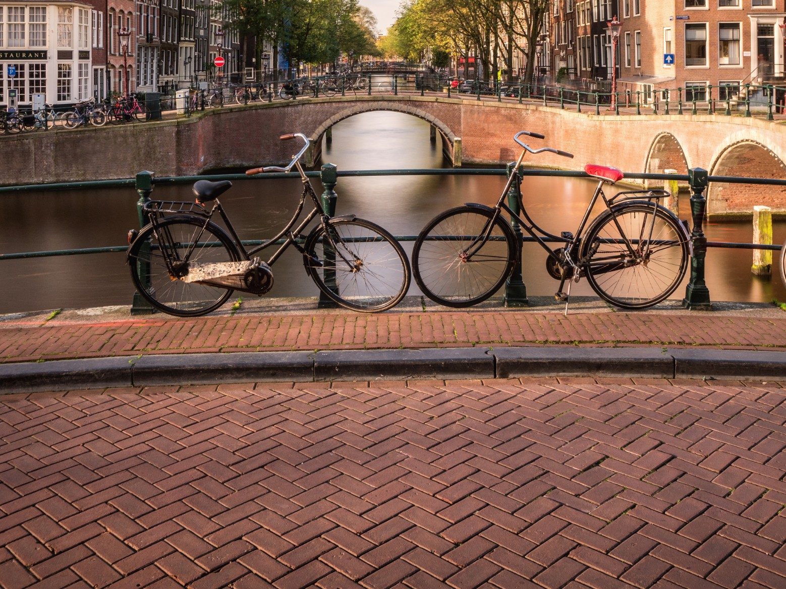 Leidesgracht and Keizersgracht canal in autumn as seen from a bridge. Captured in October 2017.