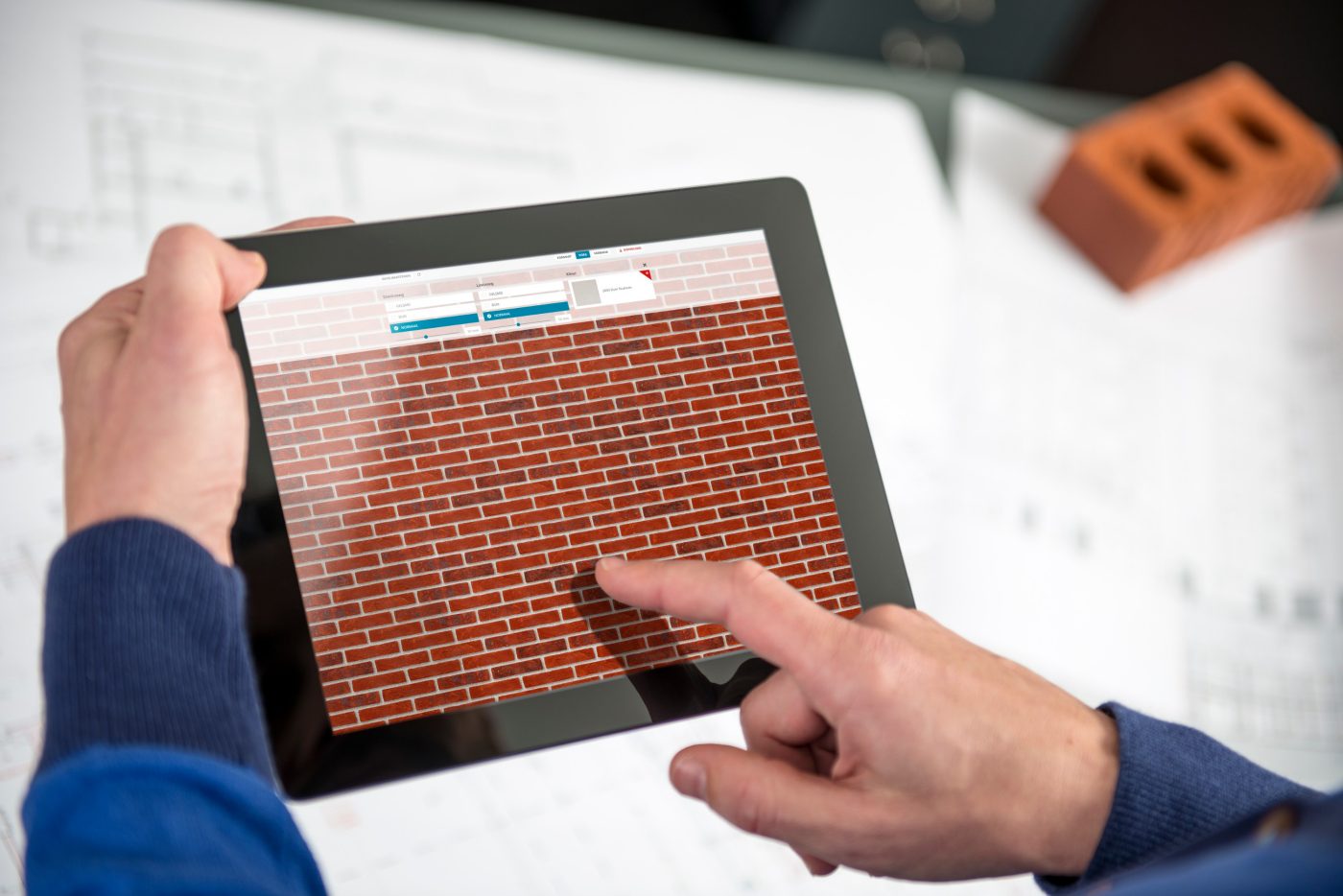 please do not use this picture unedited with its blue screen!  //  the blue layer can be replaced by any other screenshot referring to a Wienerberger related topic.